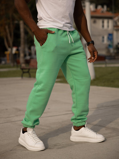 Pantalón de chándal de algodón y poliéster BROOKLYN, color verde manzana, ideal para un look casual y cómodo.