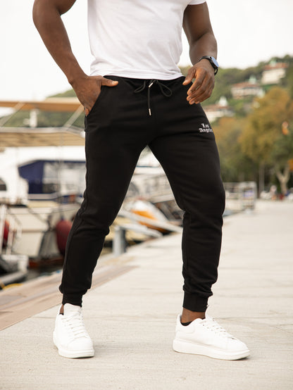 Pantalón de chándal 100% algodón color negro modelo LOS ANGELES, ideal para un estilo casual y cómodo.