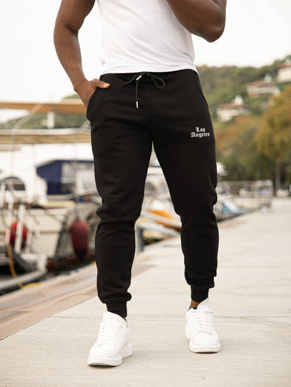 Pantalón de chándal 100% algodón color negro modelo LOS ANGELES, ideal para un estilo casual y cómodo.