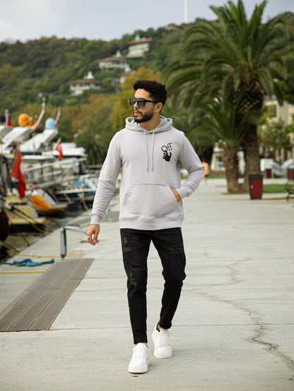 Sudadera gris  de algodón con capucha ajustable y bolsillo canguro para looks casuales