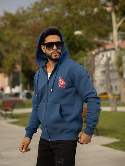 Sudadera con capucha, bolsillos y cremallera de algodón y poliéster con diseño Tokyo en color azul. Ideal para un look casual y cómodo.